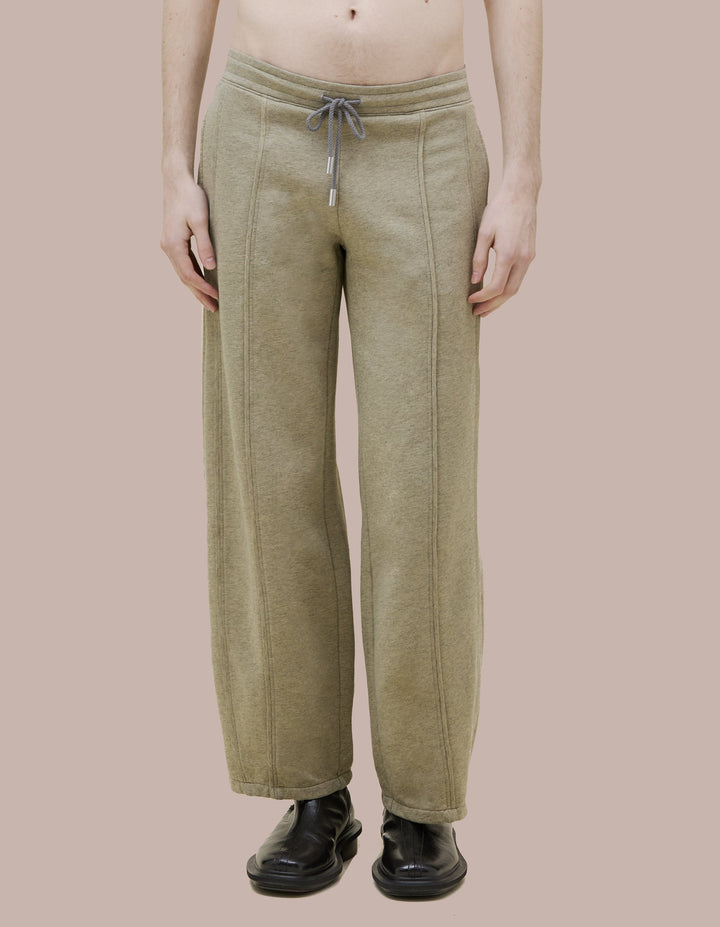 Mid-rise Eckhaus Latta sweatpants in a hether gray fleece with a wide-leg. Overdyed a pale khaki fora vintge look and finished with a glossy green ""Eckhaus Latta"" logo on the rear.