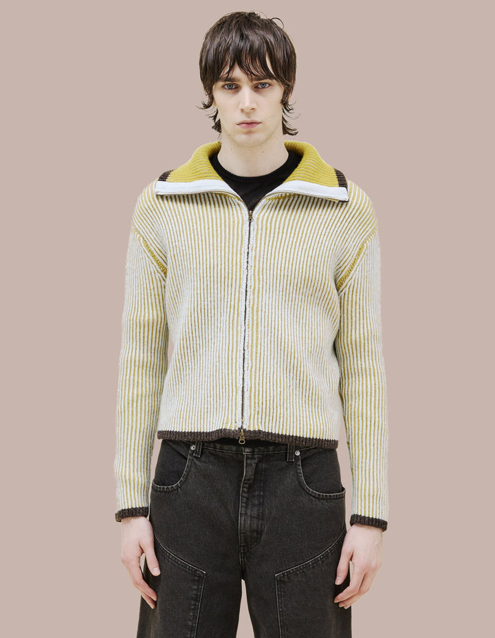 A classic zip front jacket  in a two tone, double knit merino wool. 