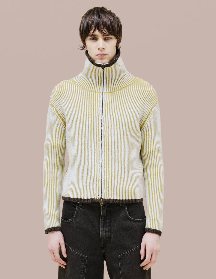 A classic zip front jacket  in a two tone, double knit merino wool. 