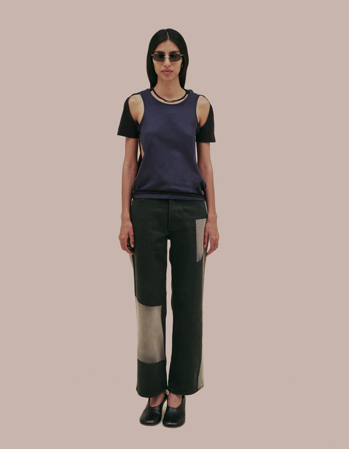 Eckhaus Latta tee shirt with cutouts. 