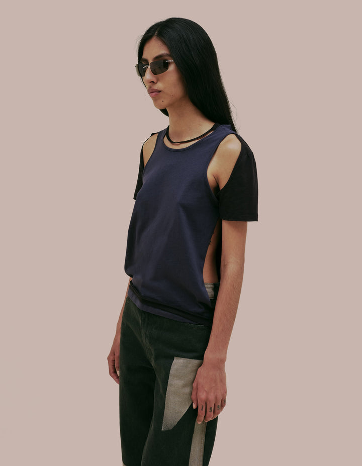 Eckhaus Latta tee shirt with cutouts. 