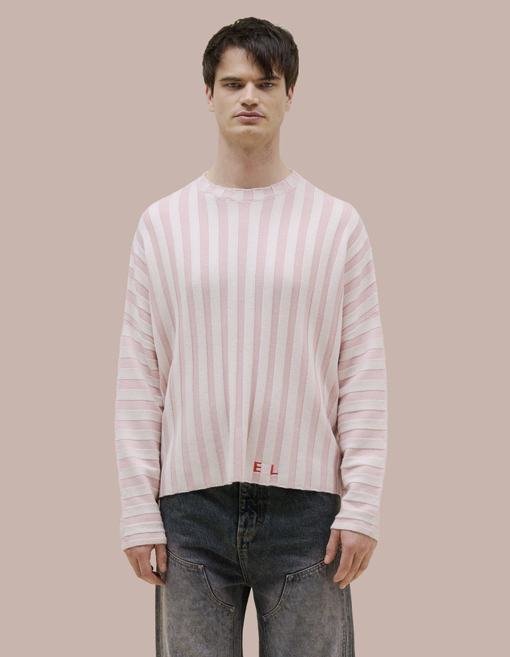 Eckhaus Latta boxy crewneck dolman shaped sweater in 100% merino wool with a contrast striped wide rib. Features our new intarsia knit EL logo in red.