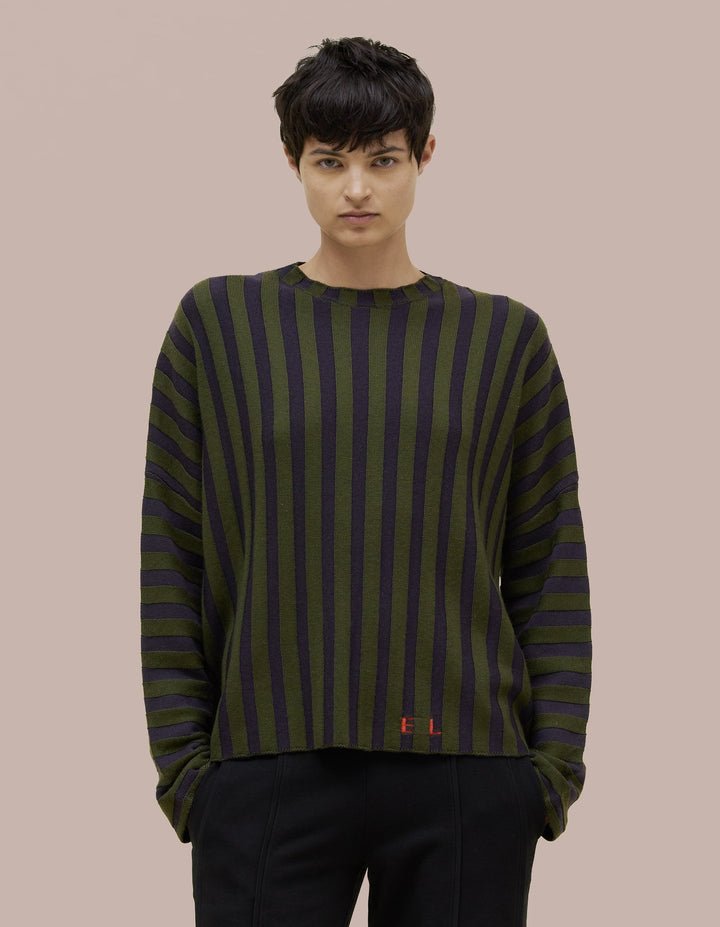 Eckhaus Latta boxy crewneck dolman shaped sweater in 100% merino wool with a contrast striped wide rib. Features our new intarsia knit EL logo in red.