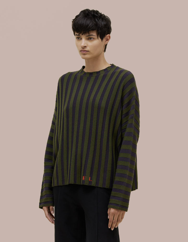 Eckhaus Latta boxy crewneck dolman shaped sweater in 100% merino wool with a contrast striped wide rib. Features our new intarsia knit EL logo in red.