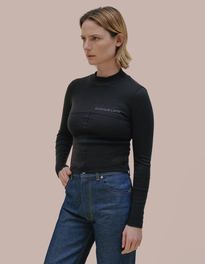 Eckhaus Latta turtleneck in black. 