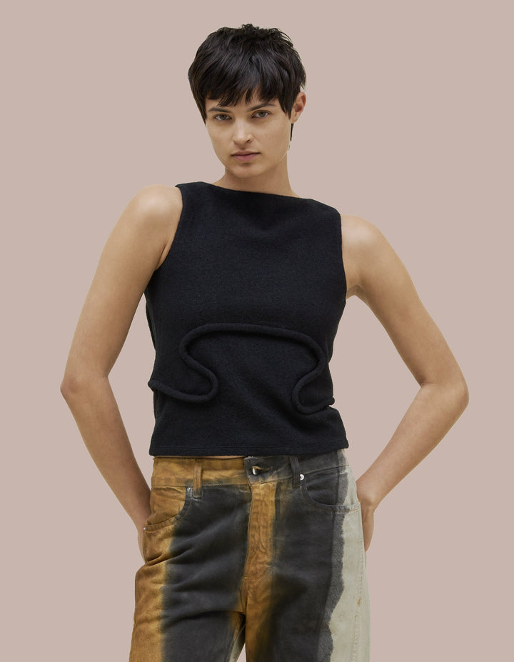Eckhaus Latta tank that features a boat neck with a boxy fit and bound curvilinear seams creating definition as they move across your body. Made from a boiled wool cotton blend.