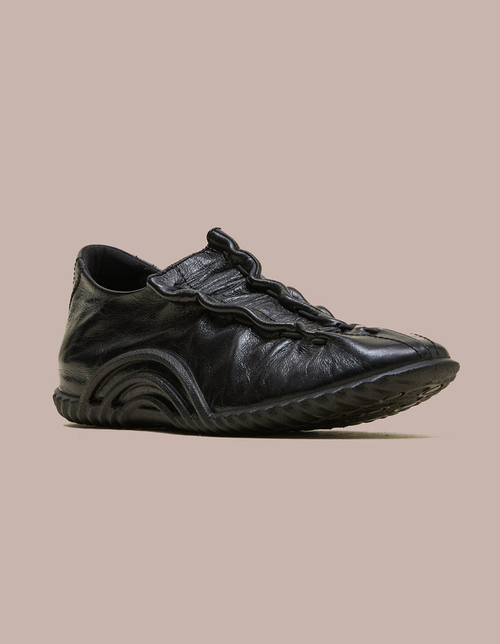 Eckhaus Latta sneaker made in collaboration with Ecco. 
