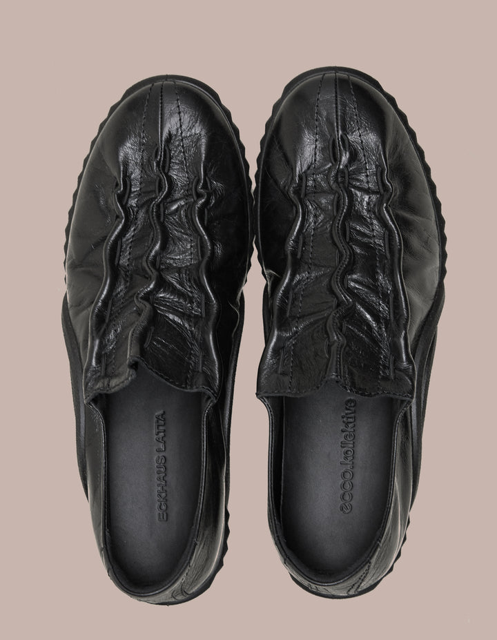 Eckhaus Latta sneaker made in collaboration with Ecco. 