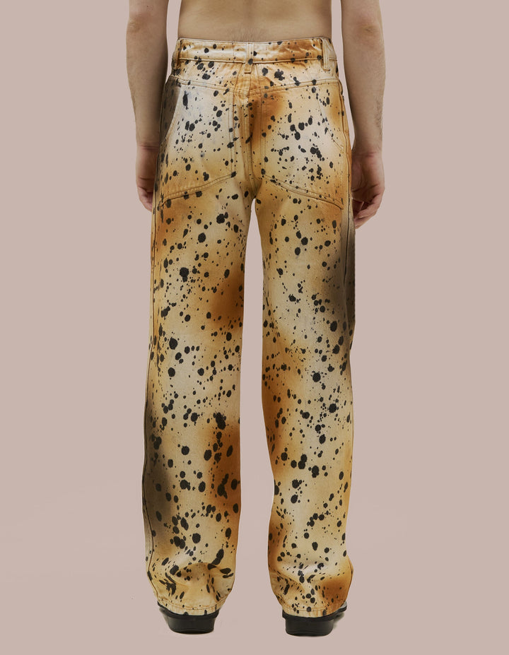14oz 100% cotton indigo denim, bleached and hand-dyed in an abstract cheetah print using splatter and spray techniques. Finished with signature EL back pockets.