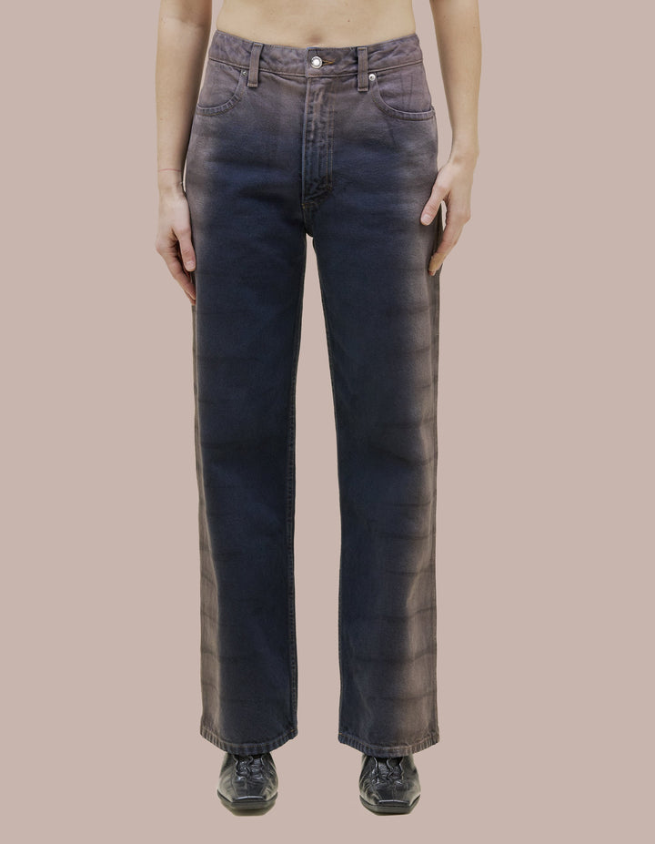 "14oz 100% cotton indigo denim, overdyed blue and bleached using the Shibori technique to reveal textured gray side seams and waistband. Finished with signature EL back pockets.
"