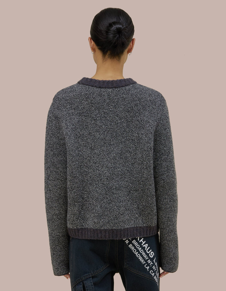 A classic crew neck silhouette constructed of a soft doublefaced knit. Has a boxy fit that hangs off the body. 