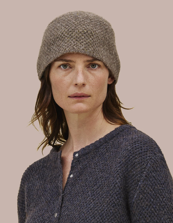 Fez shaped cap constructed from a soft doublefaced knit.